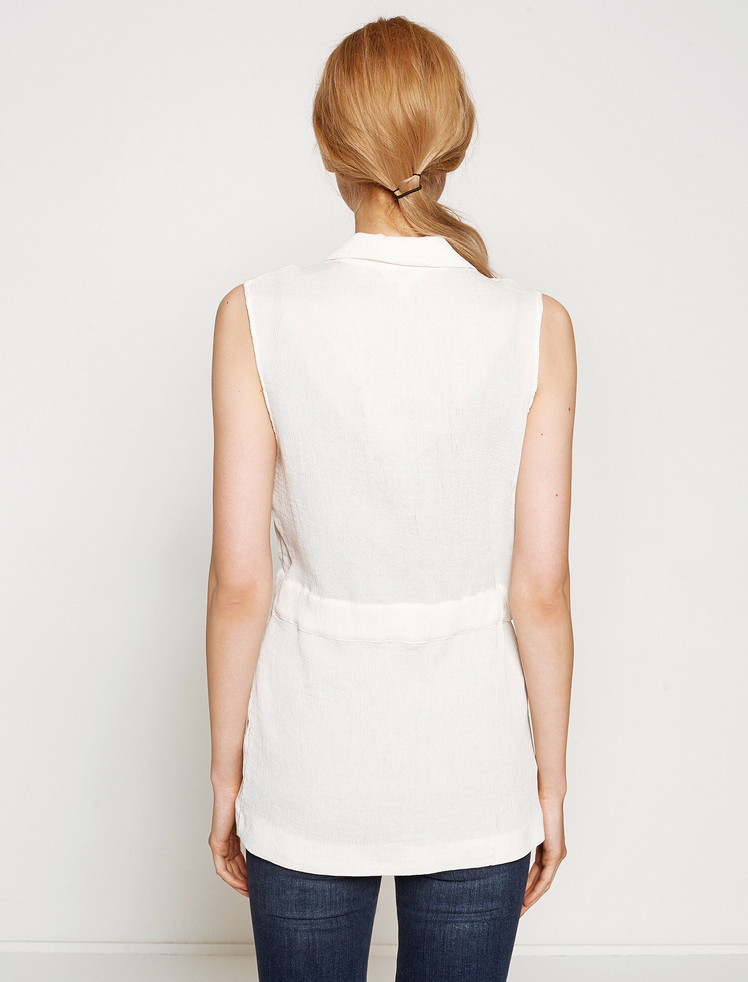 sleeveless white vest