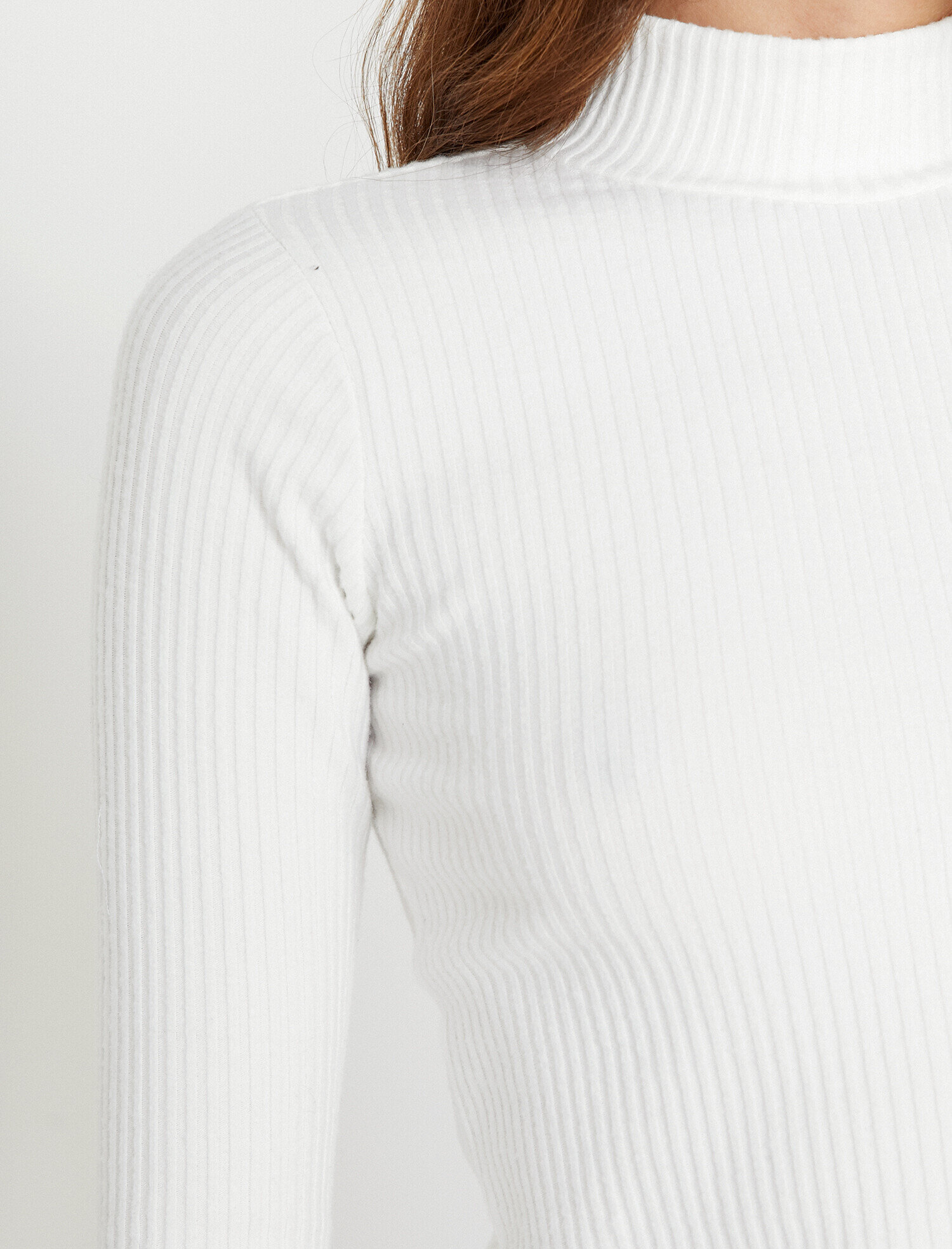 white jumper turtleneck