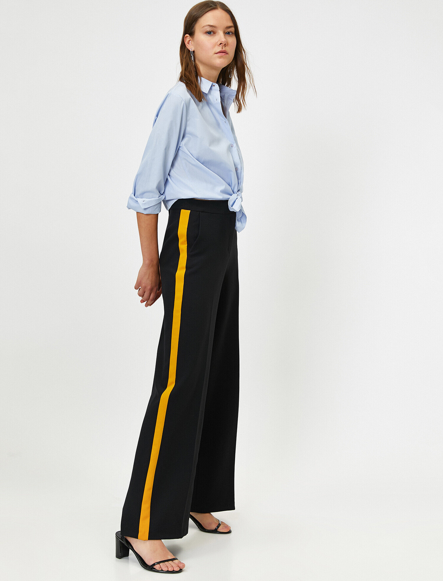 black trousers with yellow stripe