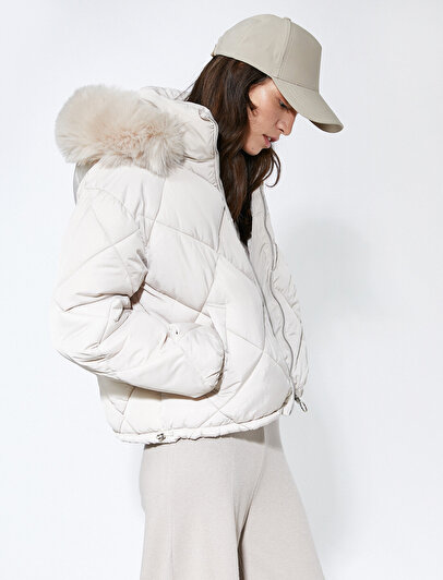 white puffer jacket with fur hood