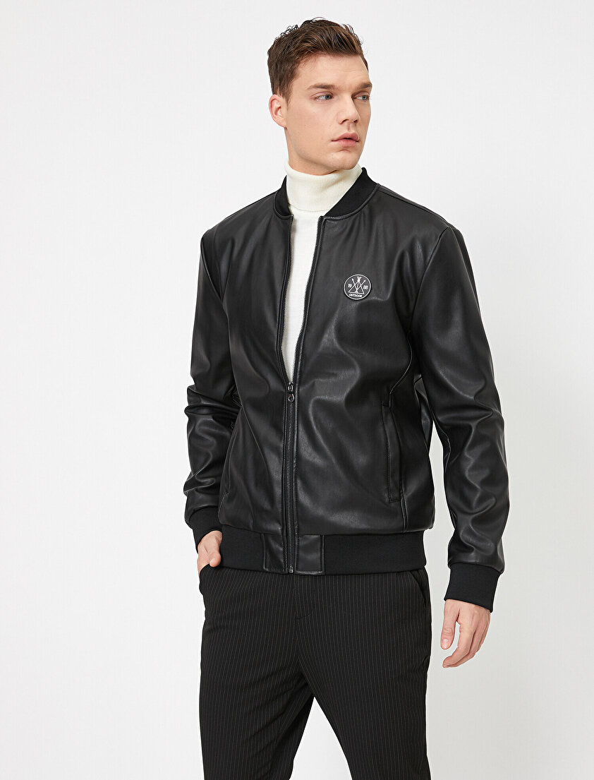 Bomber Yaka Ribanalı Arma Detaylı Deri Görünümlü Mont