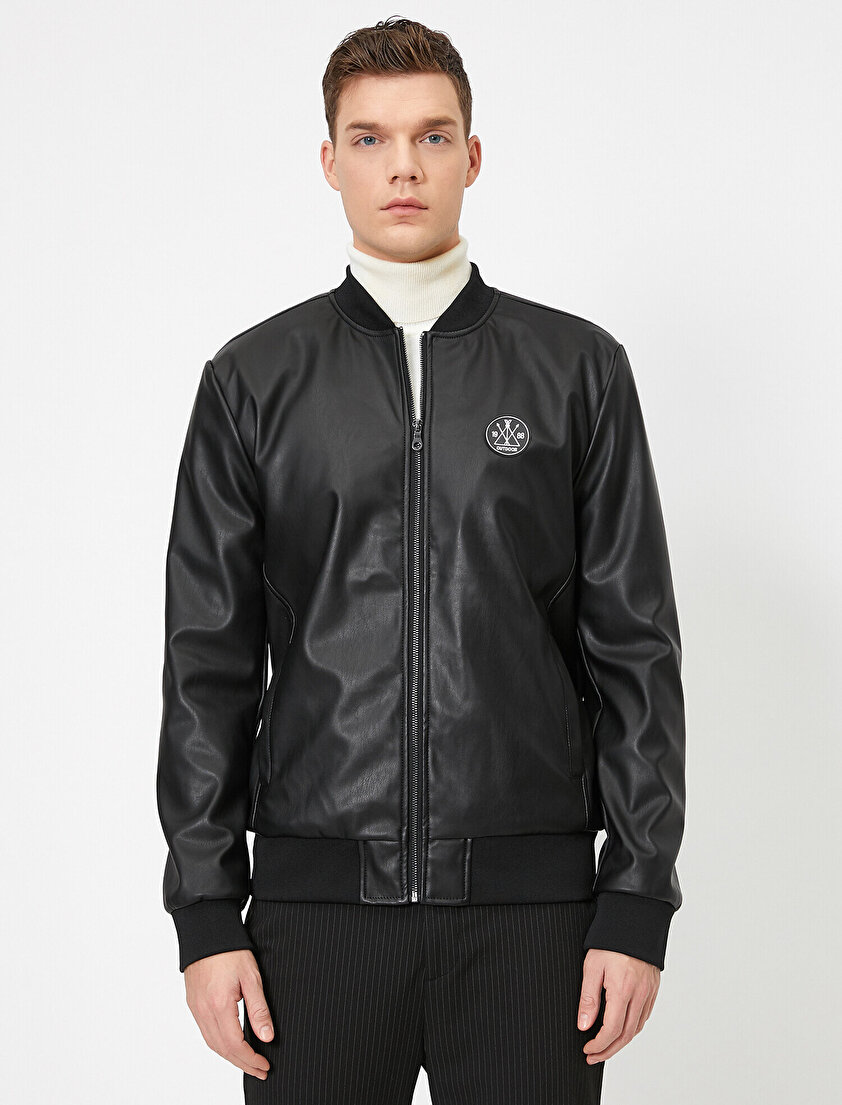 Bomber Yaka Ribanalı Arma Detaylı Deri Görünümlü Mont