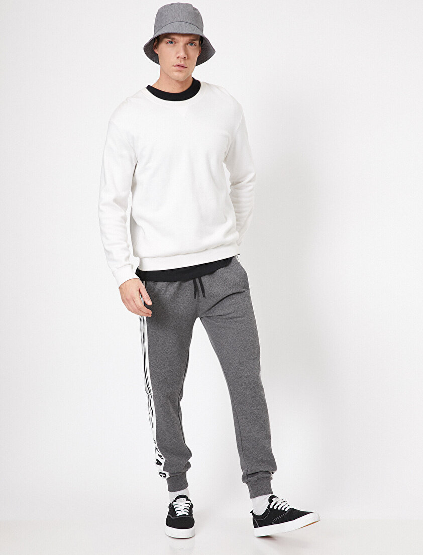 Yanları Baskılı Şerit Detaylı Cepli Paçası Lastikli Eşofman Altı