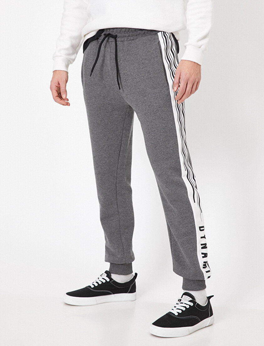 Yanları Baskılı Şerit Detaylı Cepli Paçası Lastikli Eşofman Altı