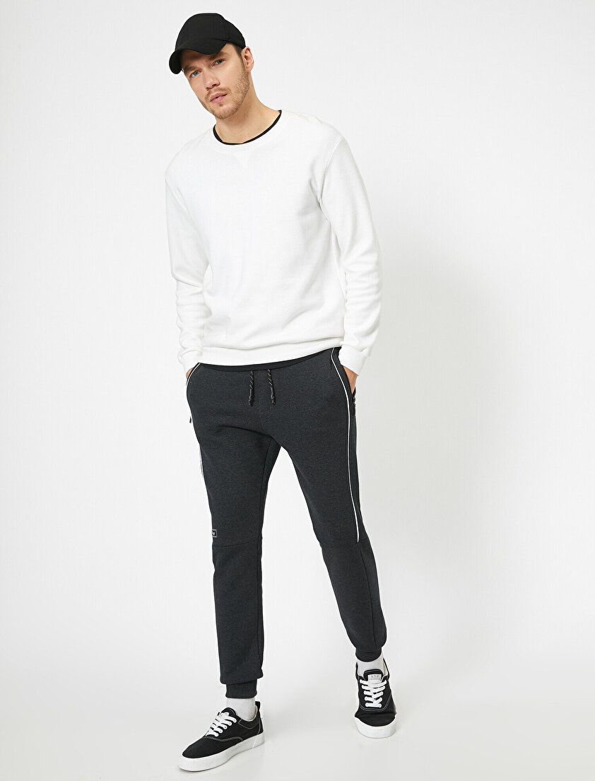 Yanları Şerit Detaylı Süs Etiketli Paçası Lastikli Cepli Eşofman Altı