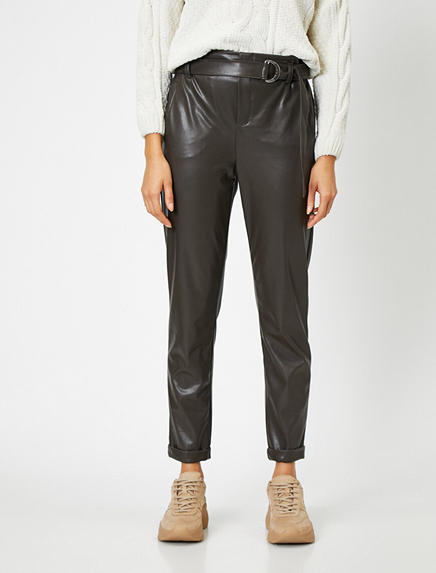 brown leather look trousers