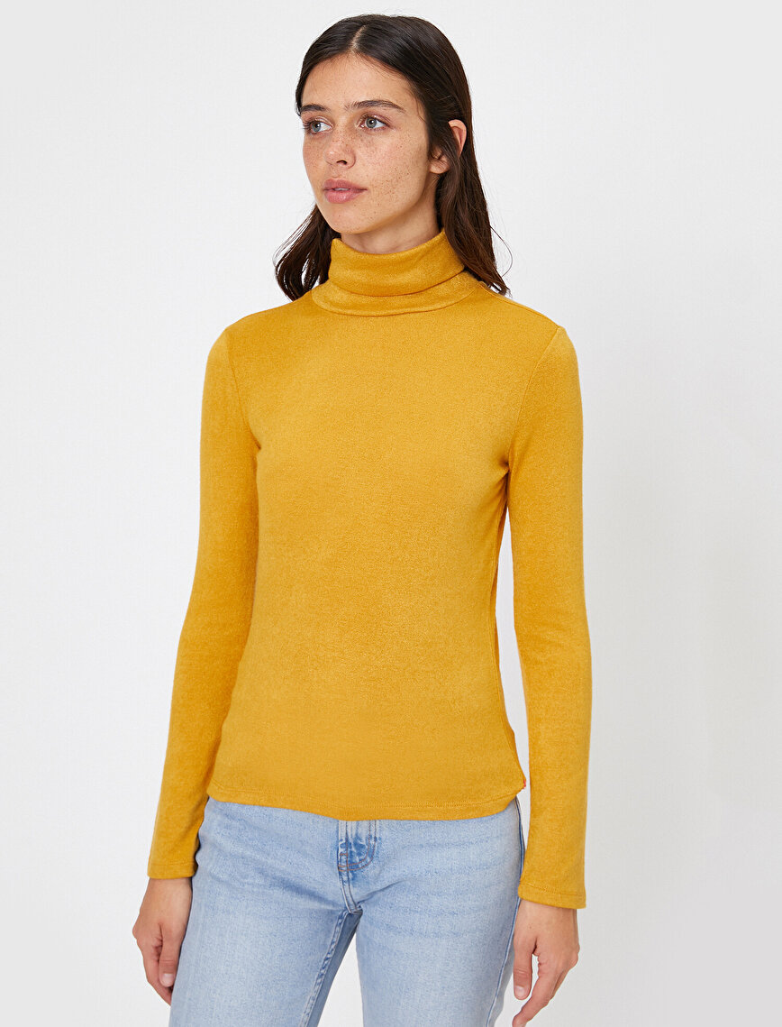 yellow polo neck jumper