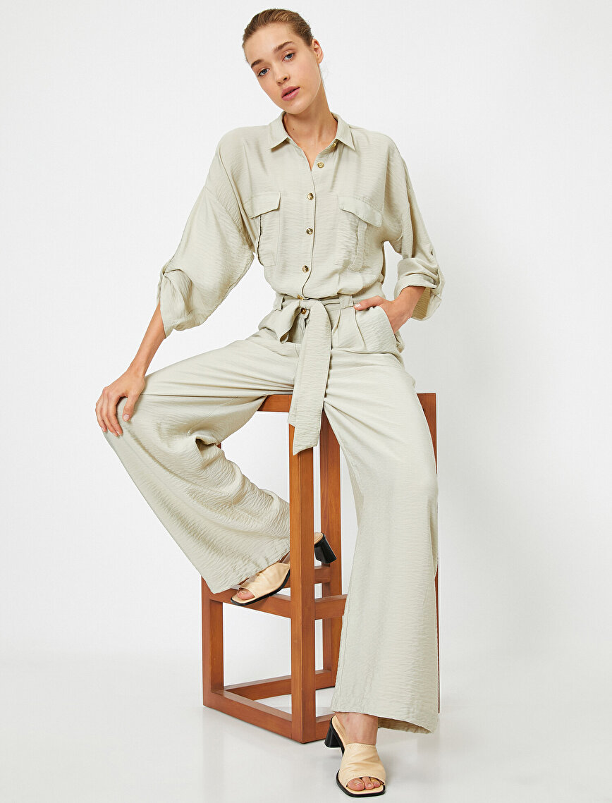 Pocketed Buttoned Belted Jumpsuit