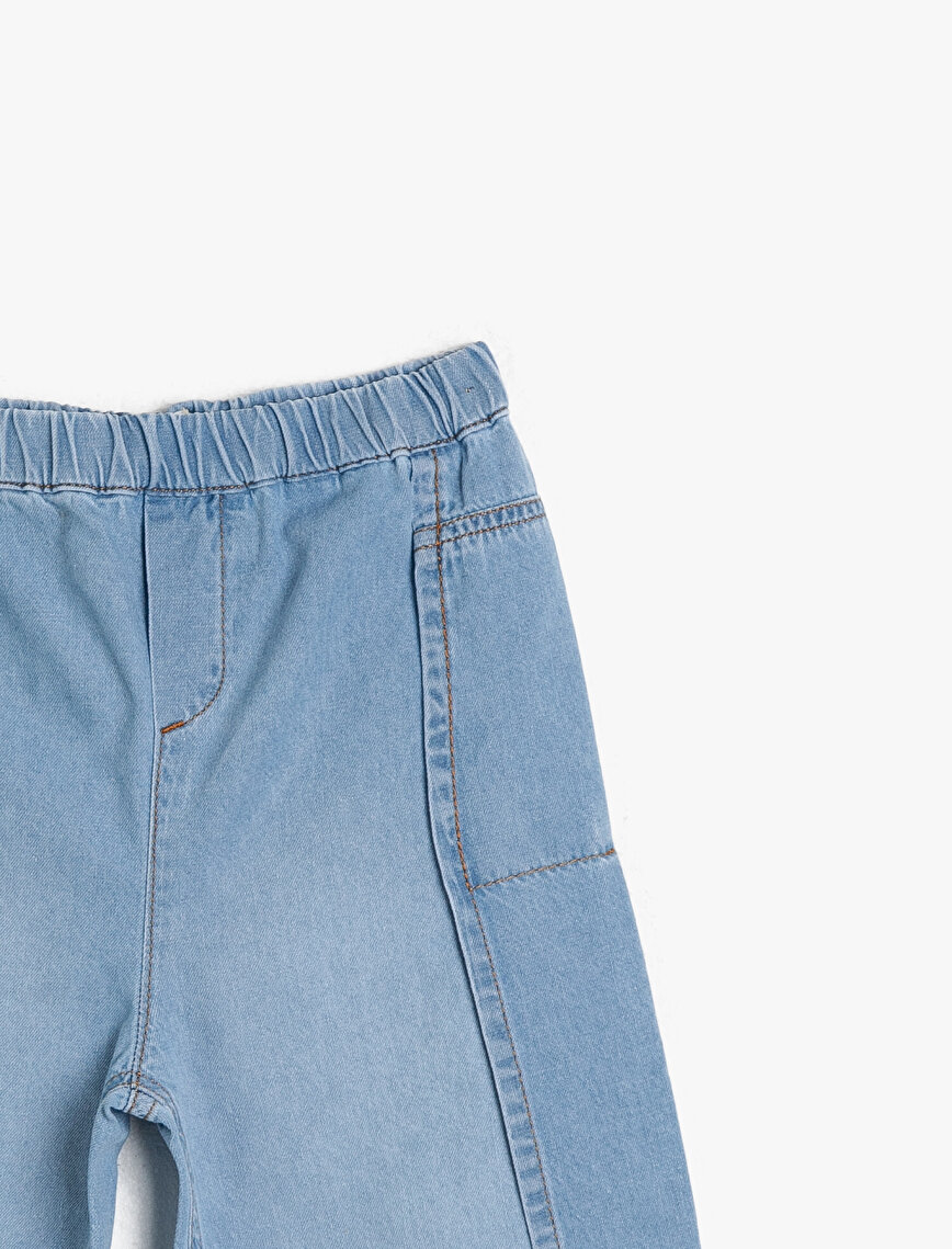 Beli Lastikli Bol Kesim Paçası Bol Dökümlü Kısa Paça Normal Bel Jean Pantolon
