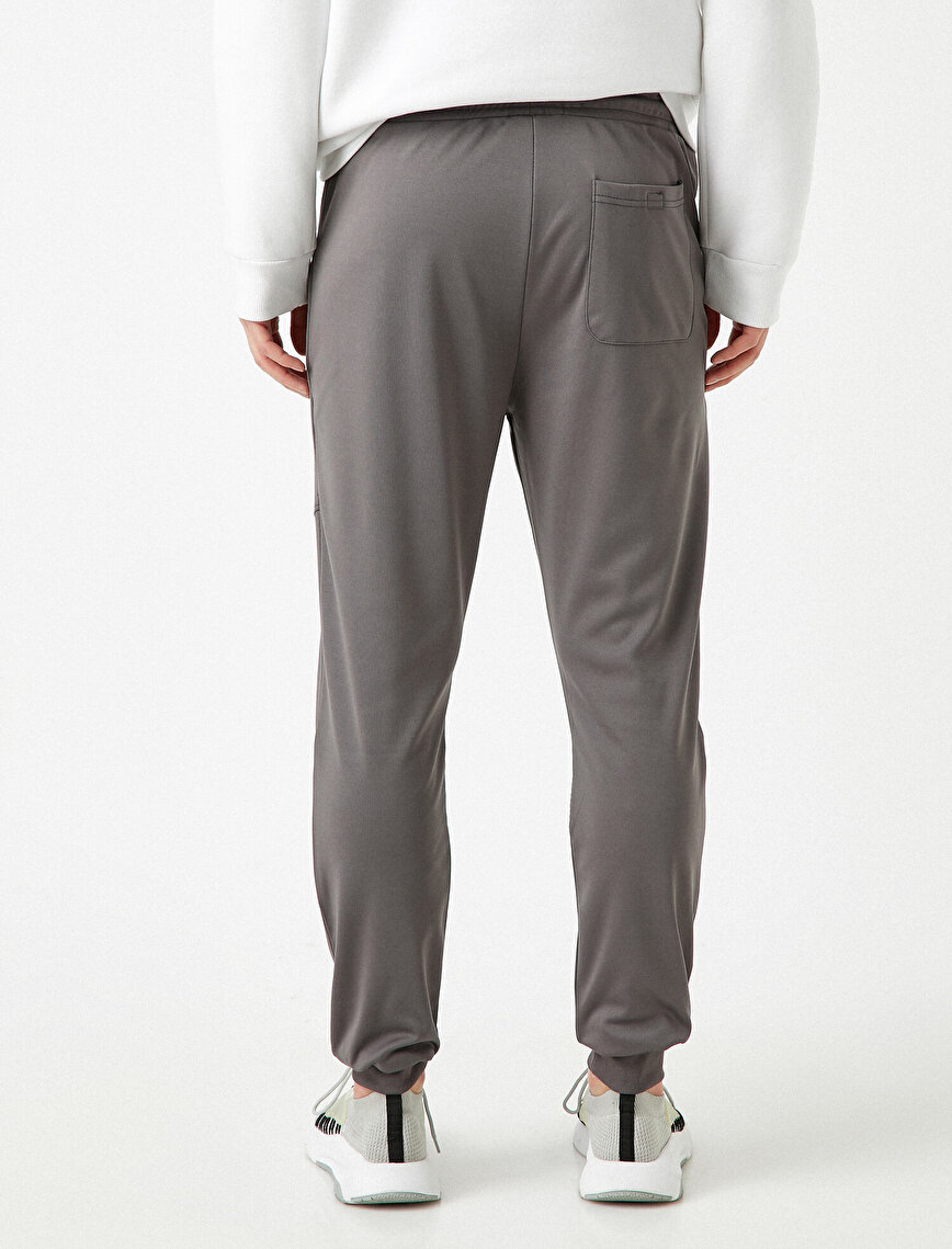 Pocket Zipper Detailed Medium Rise Jogging Pants